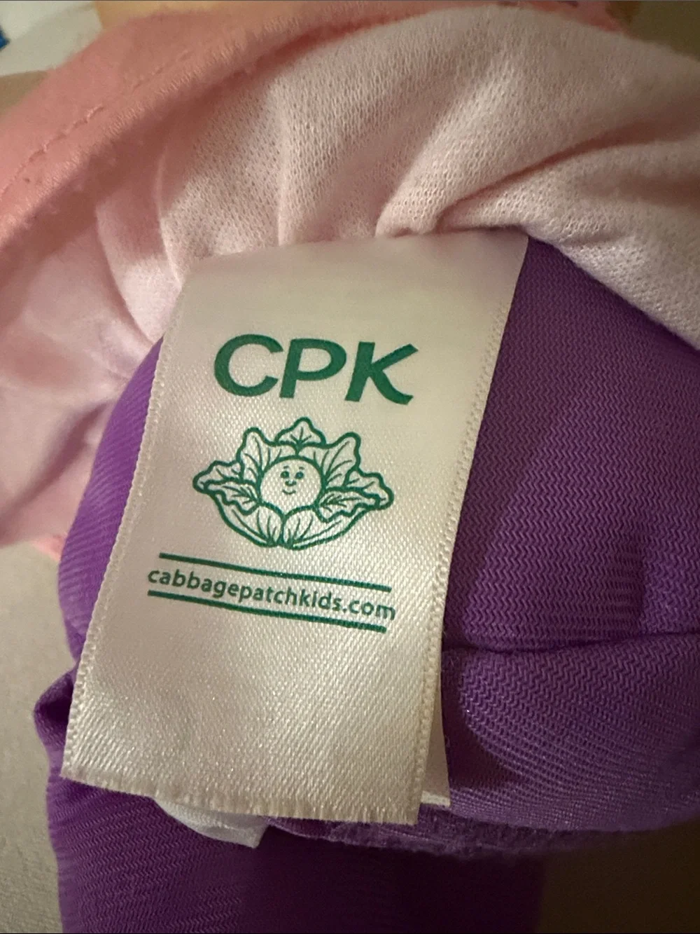 Cabbage Patch Kids play cuddly